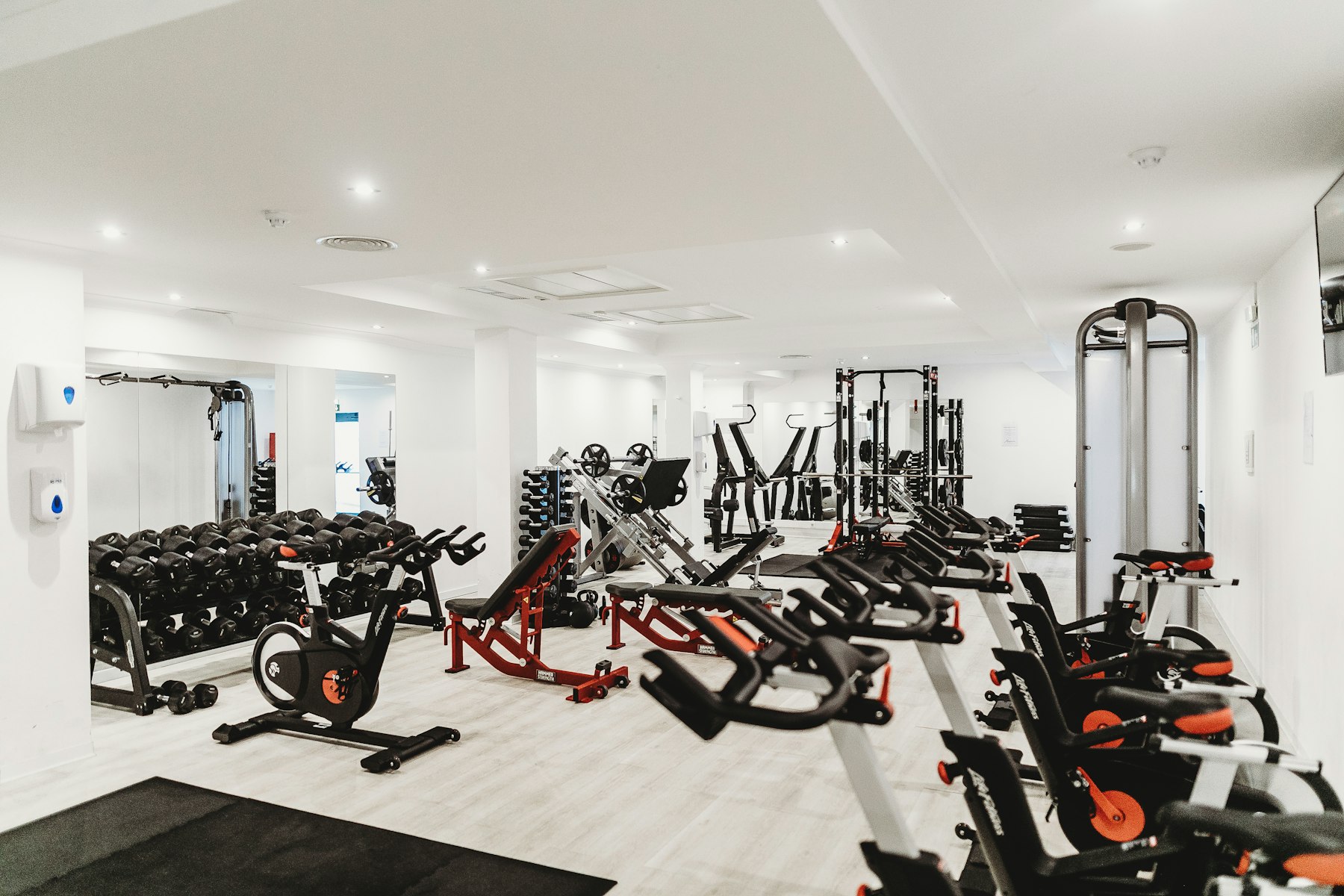 Gym interior with machines and free weights